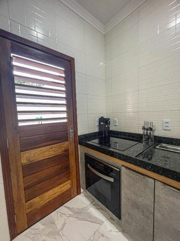 Kuchyň nebo kuchyňský kout v ubytování Life House Ubajara