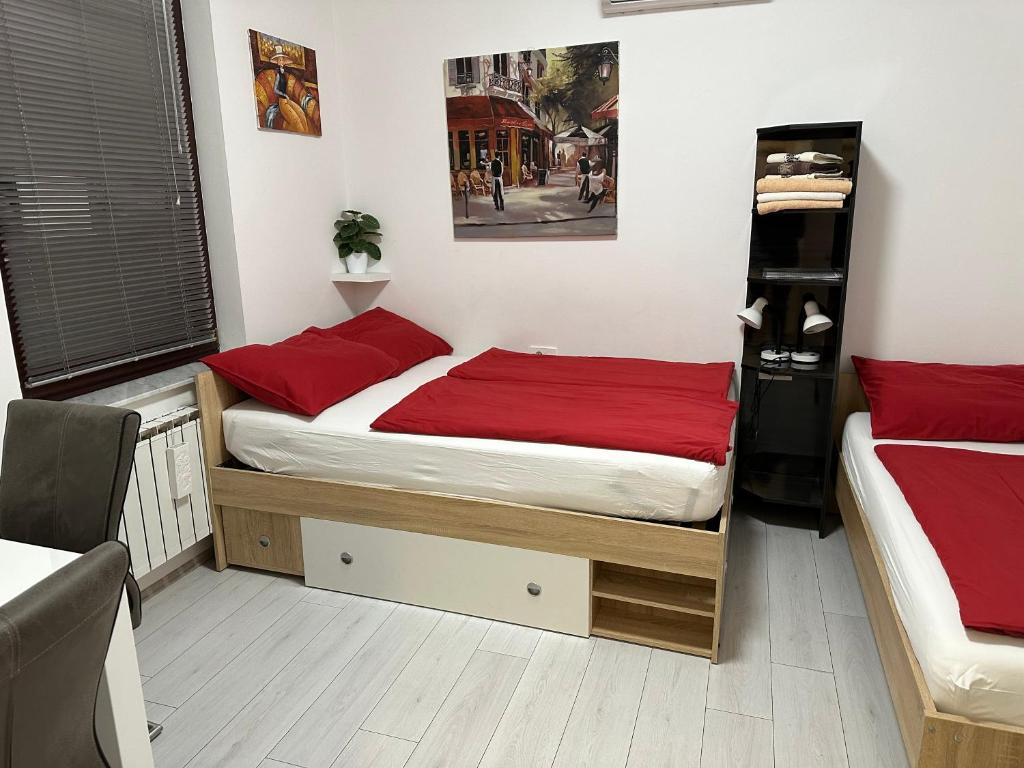 Postel nebo postele na pokoji v ubytování Leptir