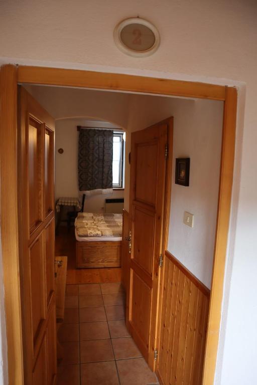 Postel nebo postele na pokoji v ubytování Dům u Giordanu