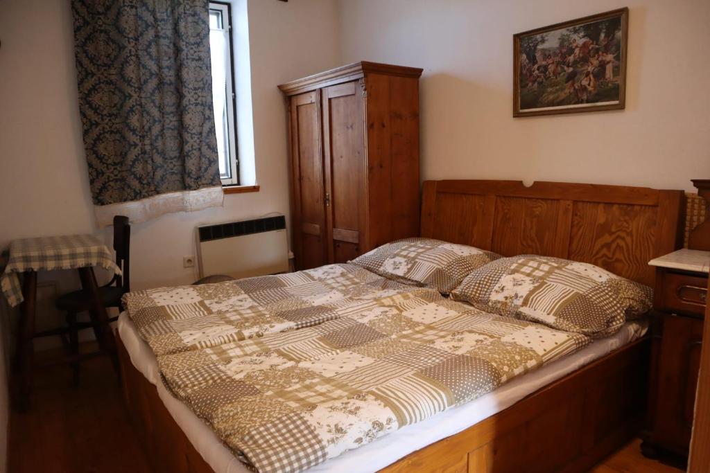 Postel nebo postele na pokoji v ubytování Dům u Giordanu