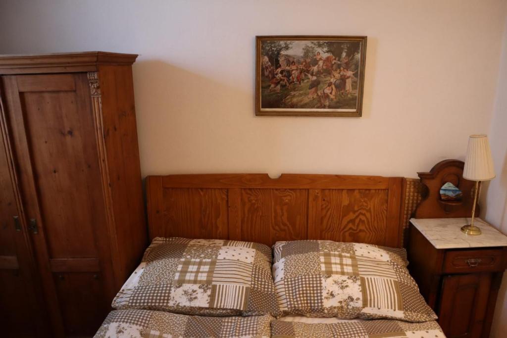 Postel nebo postele na pokoji v ubytování Dům u Giordanu