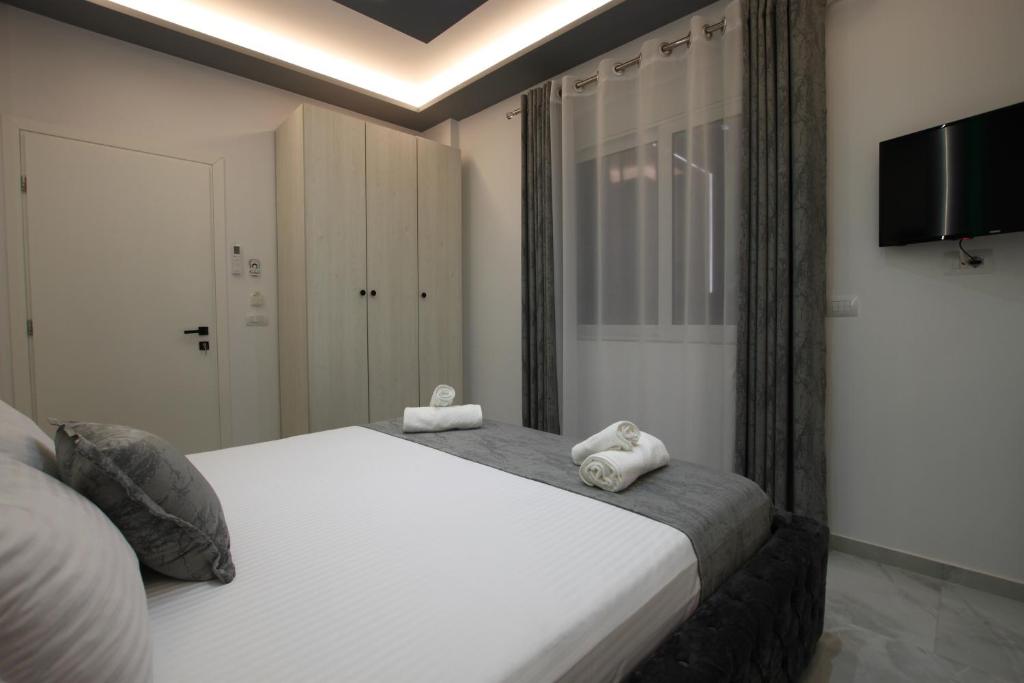 Ένα ή περισσότερα κρεβάτια σε δωμάτιο στο Vila Roxhest