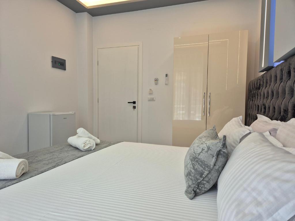 Ένα ή περισσότερα κρεβάτια σε δωμάτιο στο Vila Roxhest