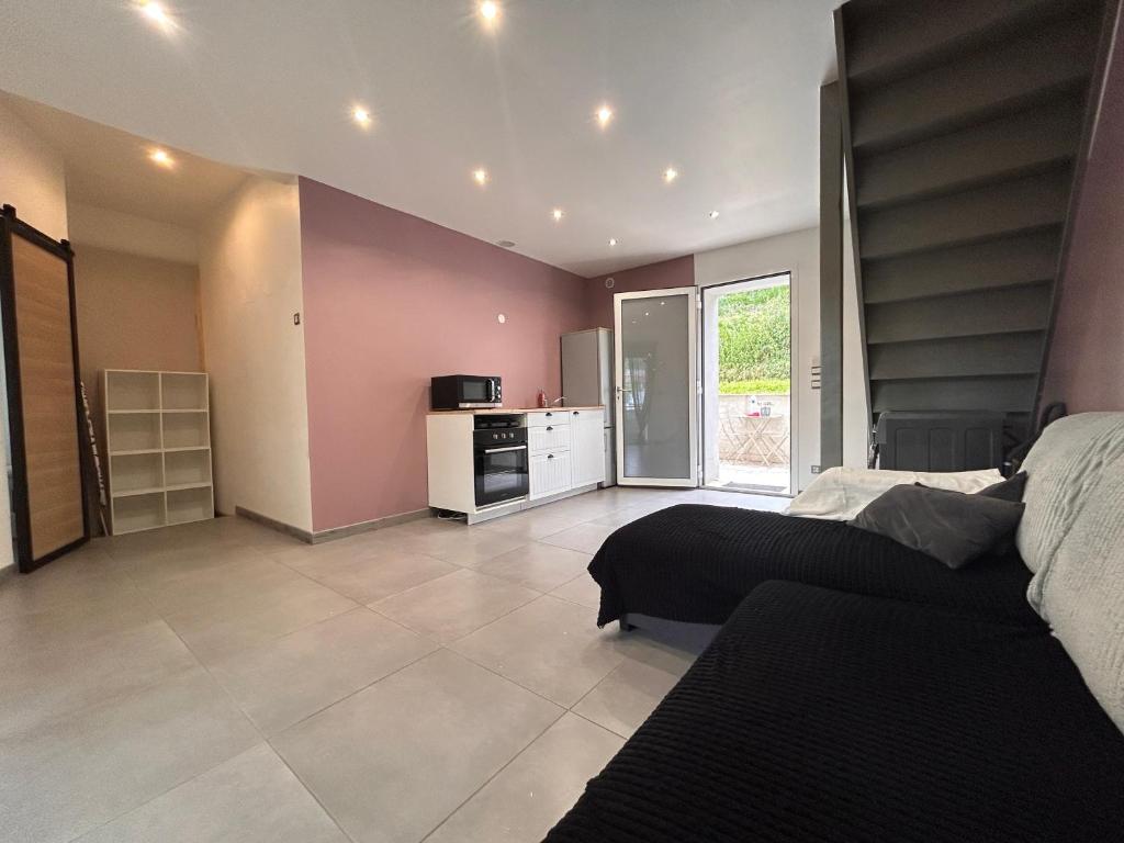 Kuchyň nebo kuchyňský kout v ubytování Magnifique appartement avec jardin et terrasse