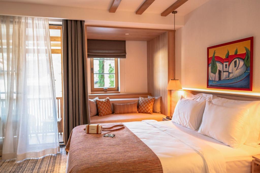 Postel nebo postele na pokoji v ubytování Hotel Baškuća Sarajevo