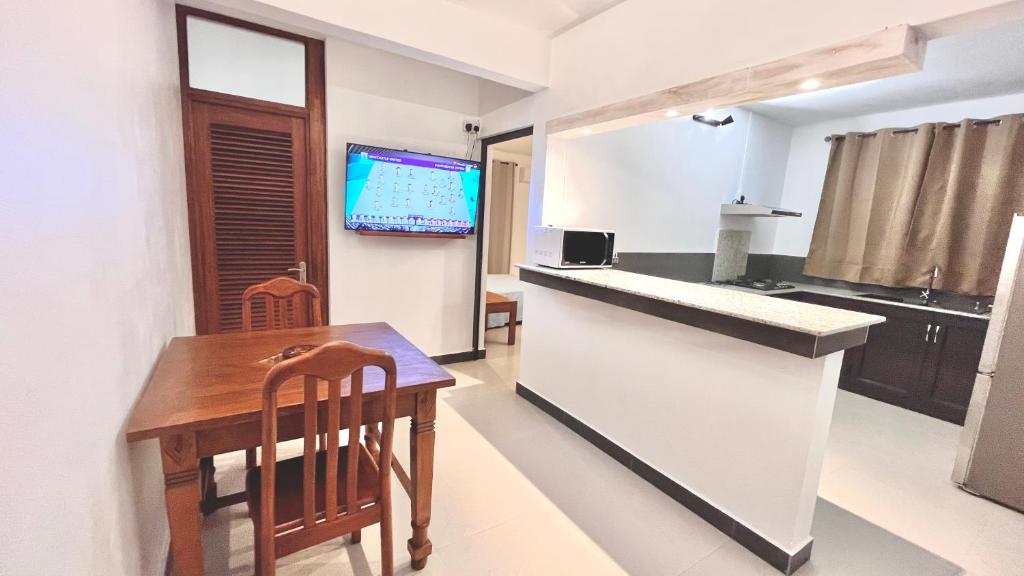 Kuchyň nebo kuchyňský kout v ubytování Ebony Apartment & Studio