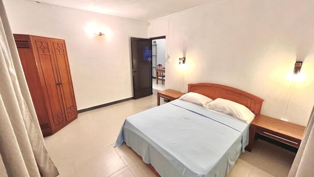 Postel nebo postele na pokoji v ubytování Ebony Apartment & Studio