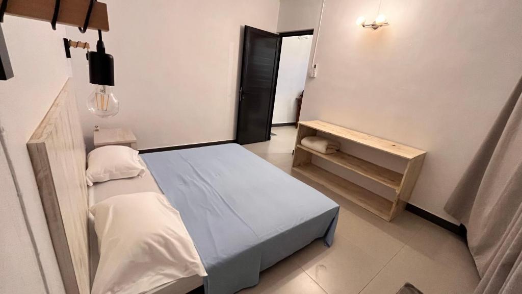 Postel nebo postele na pokoji v ubytování Ebony Apartment & Studio