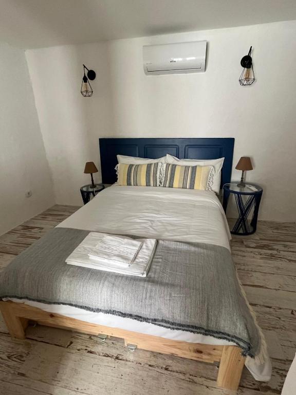 Postel nebo postele na pokoji v ubytování Cantinho da Villa