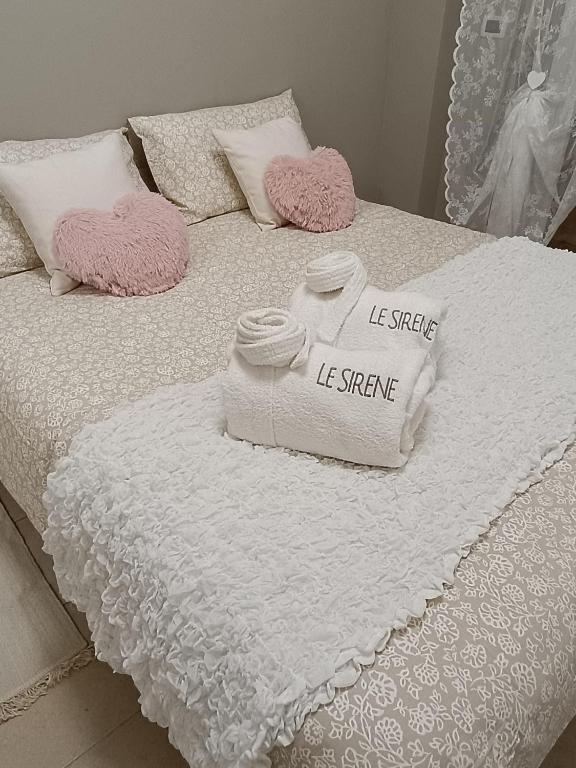 Postel nebo postele na pokoji v ubytování Le Sirene Sweet Home