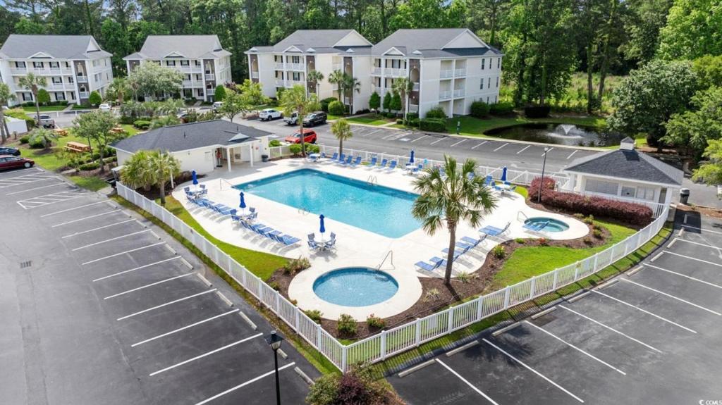 an aerial view of a pool at a apartment complex at Stunning 3 Bedroom Condo-Recently Renovated-Fairways Unit D in Myrtle Beach