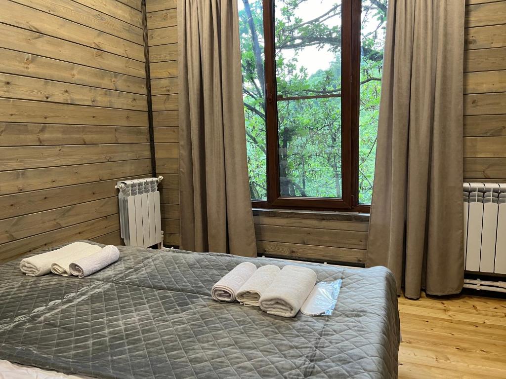 Postel nebo postele na pokoji v ubytování Balkonchik GuestHouse