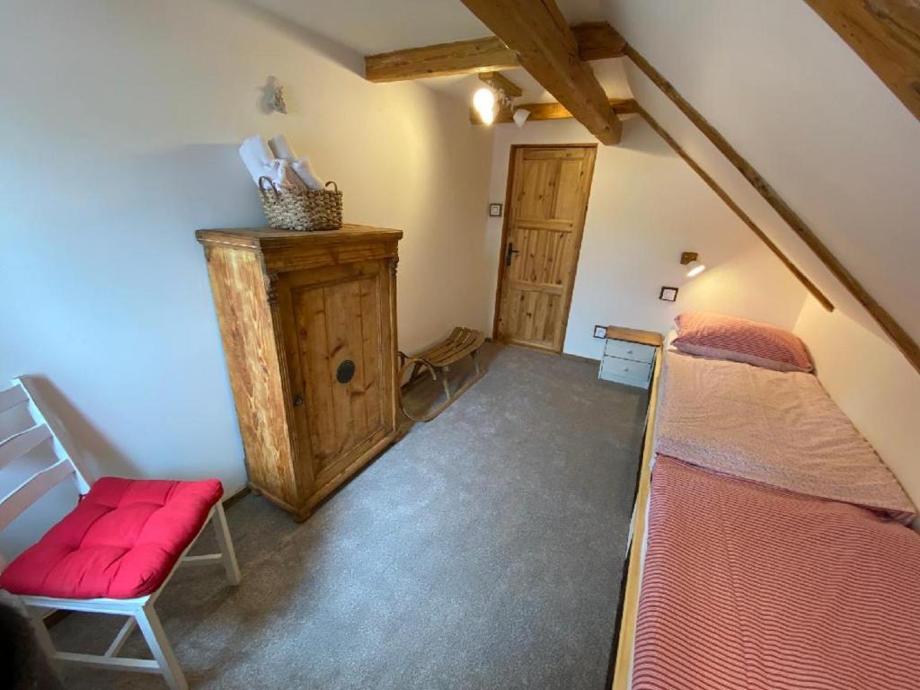 Postel nebo postele na pokoji v ubytování Apartmány u Dostálů