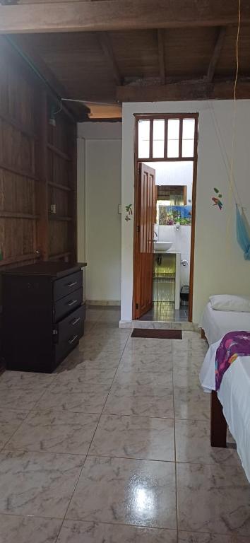 Postel nebo postele na pokoji v ubytování Cabañas Arrecifes