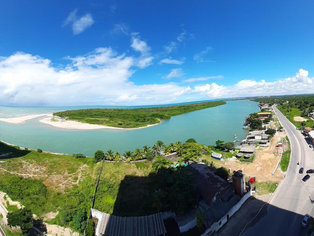 an aerial view of a river and a beach at BUGAN PAIVA RECIFE in Recife