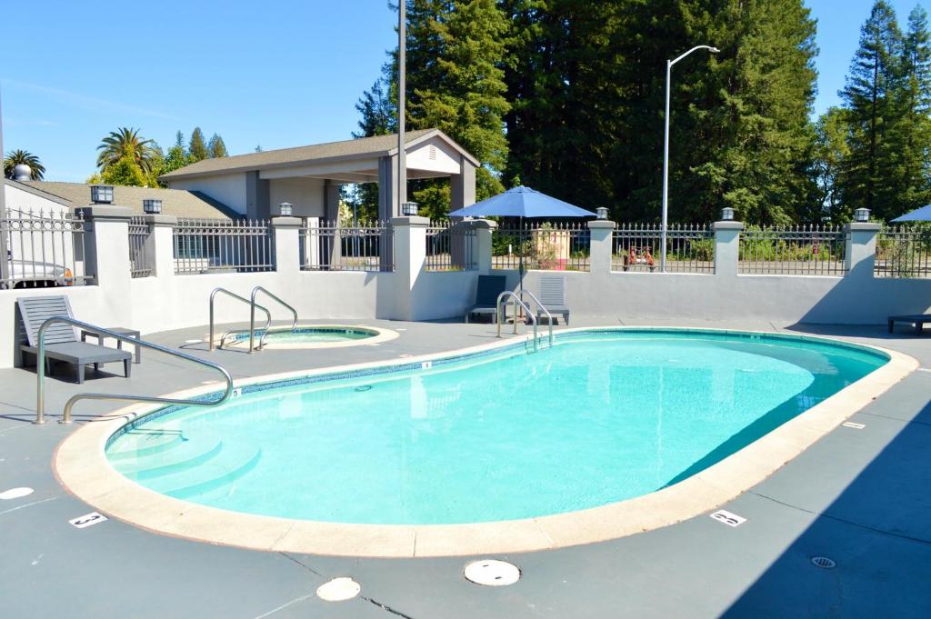 a large swimming pool with blue water at Fairview Inn & Suites in Healdsburg