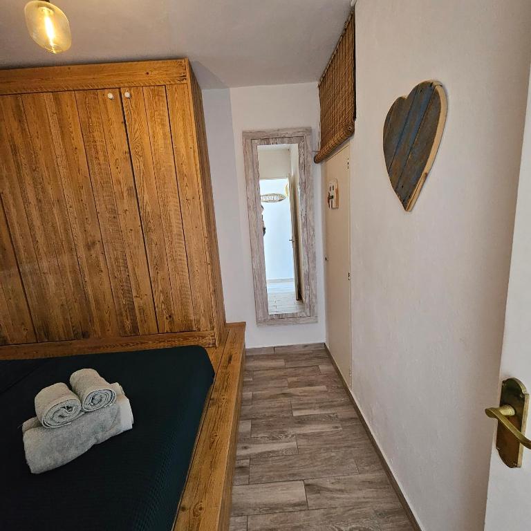 Postel nebo postele na pokoji v ubytování Pujols 1