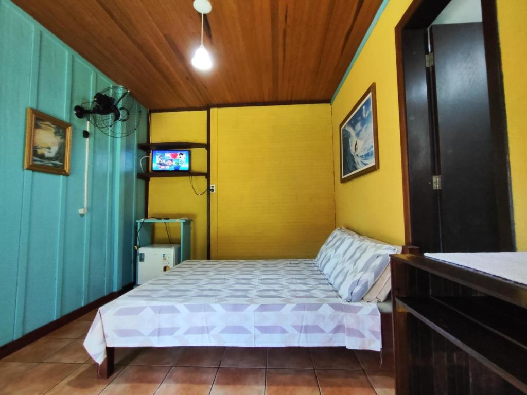 Cama ou camas em um quarto em Pousada Do Chicão