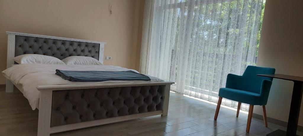 Postel nebo postele na pokoji v ubytování Spa Hotel Alpin
