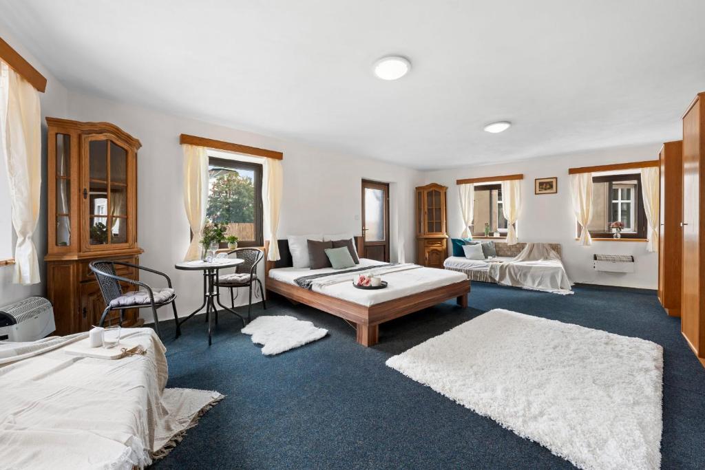Postel nebo postele na pokoji v ubytování Apartmány BAROKO