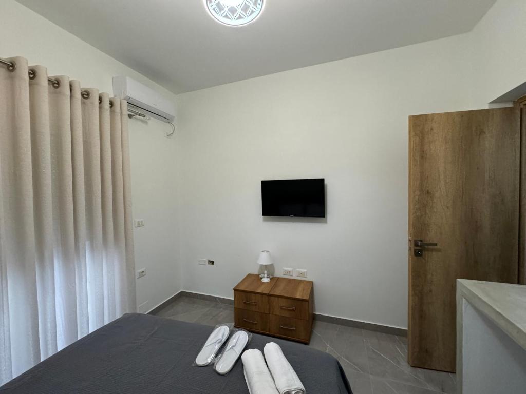 TV a/nebo společenská místnost v ubytování Angelo Agapi Rooms Vlore