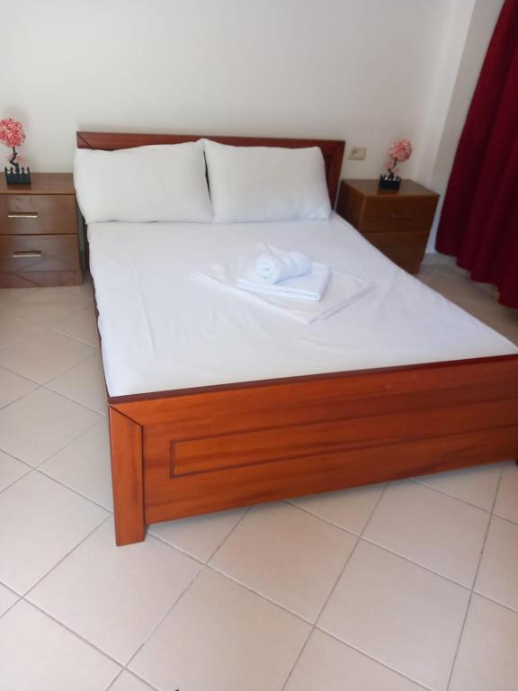 Postel nebo postele na pokoji v ubytování Hotel Taverna Prifti