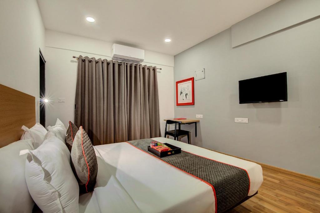 TV a/nebo společenská místnost v ubytování Hotel O Evergreen