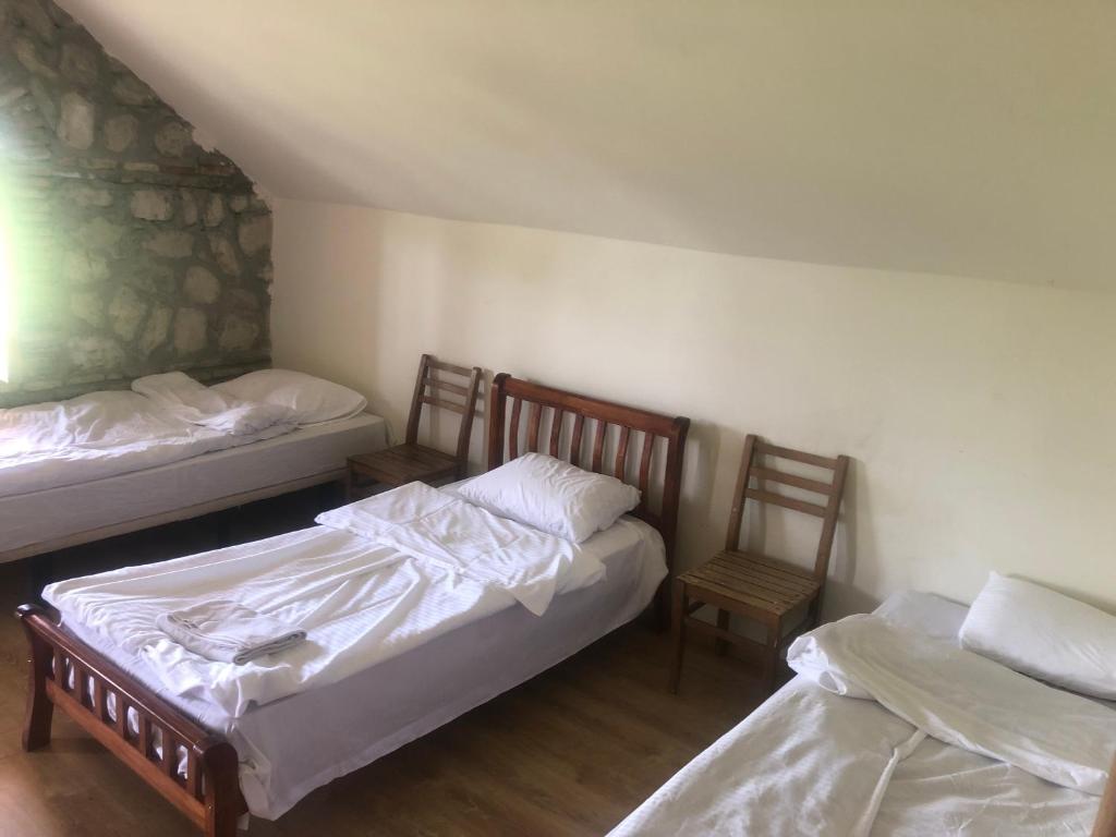 Postel nebo postele na pokoji v ubytování Elizbar Talakvadze Winery