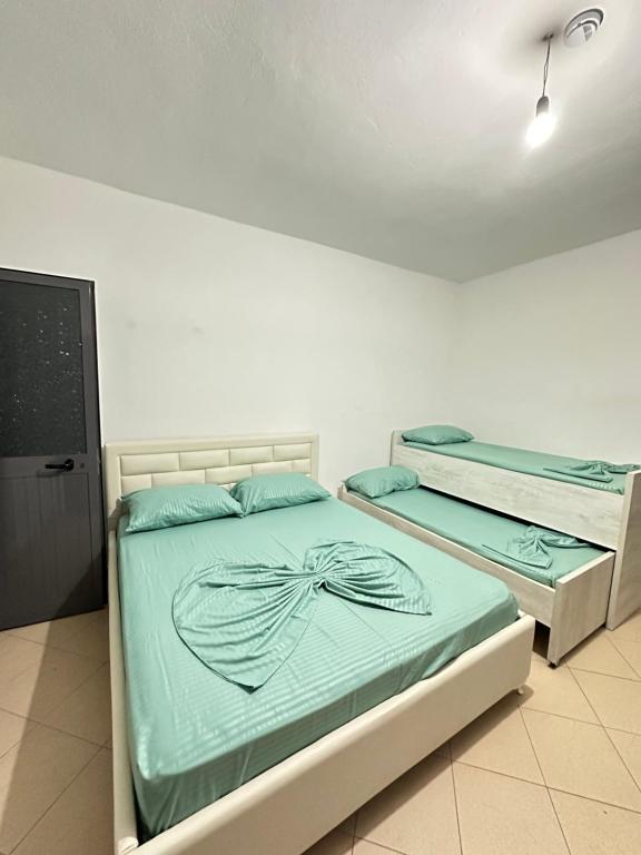 Postel nebo postele na pokoji v ubytování Hotel 24