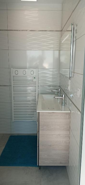 Koupelna v ubytování Chambre avec terrasse privative et vue mer