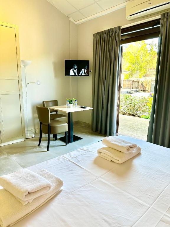 Postel nebo postele na pokoji v ubytování Hotel Fortuny javea