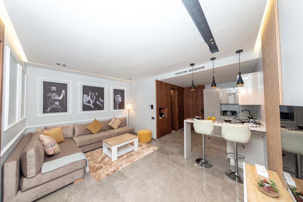 Χώρος καθιστικού στο Studio Neuf et Luxueux à 300m du Grand Stade