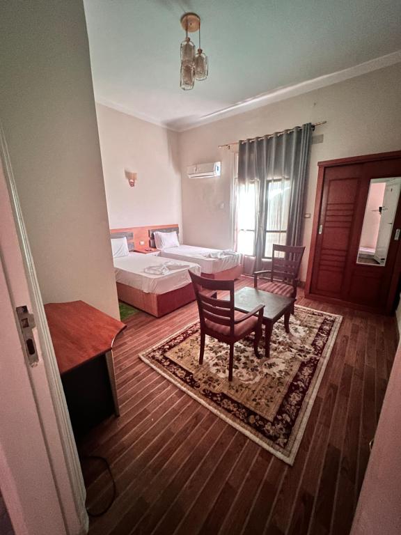Postel nebo postele na pokoji v ubytování Zoser hostel