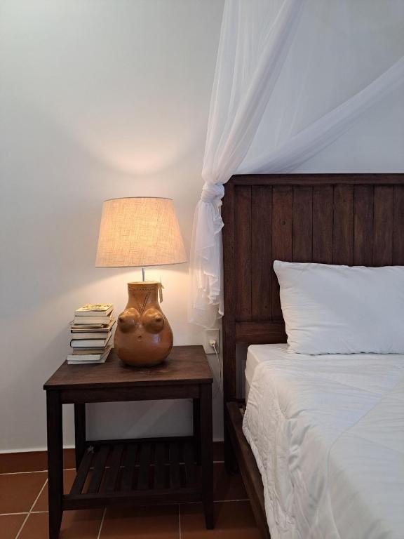 Postel nebo postele na pokoji v ubytování La nho House
