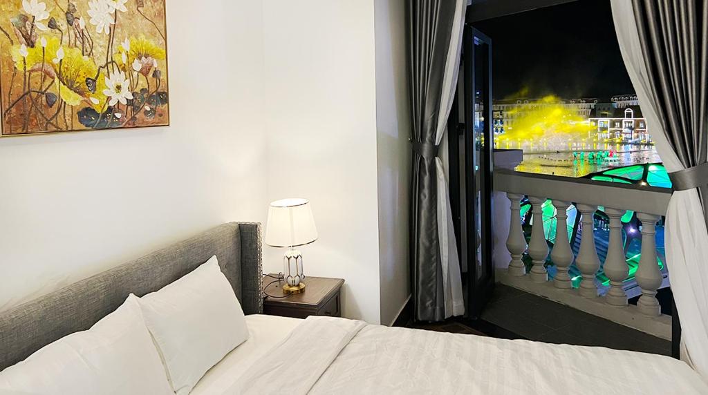 Posteľ alebo postele v izbe v ubytovaní Legacy Phú Quốc