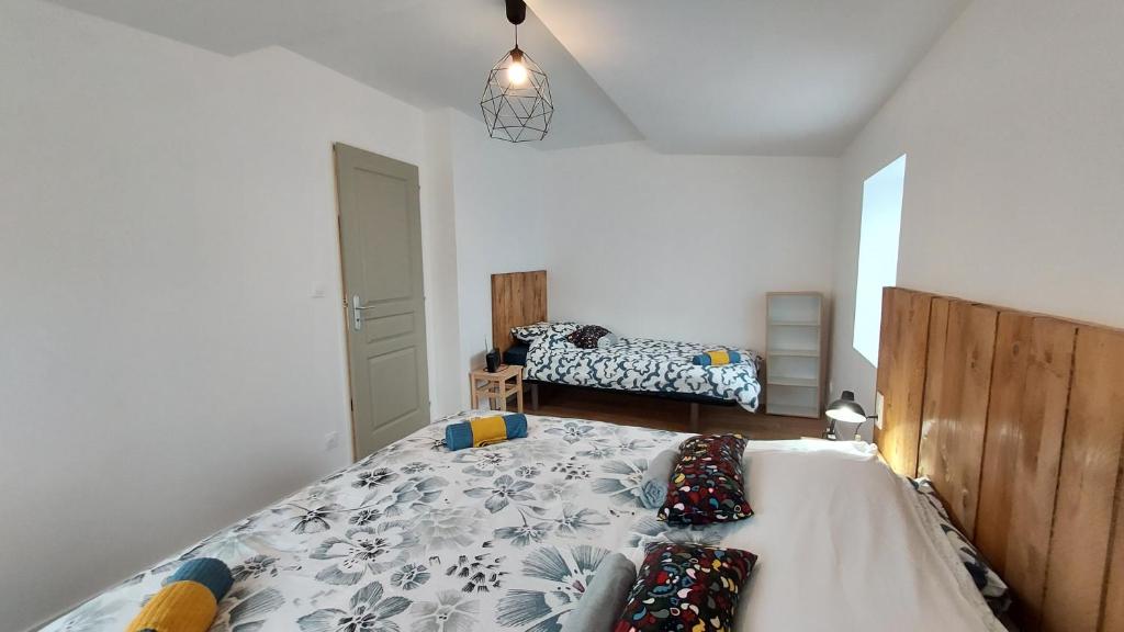 Postel nebo postele na pokoji v ubytování Suite à l'Oasis de Chamousset