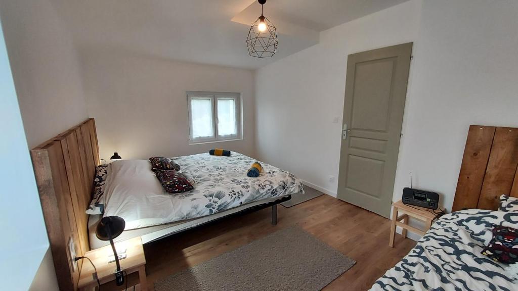 Postel nebo postele na pokoji v ubytování Suite à l'Oasis de Chamousset