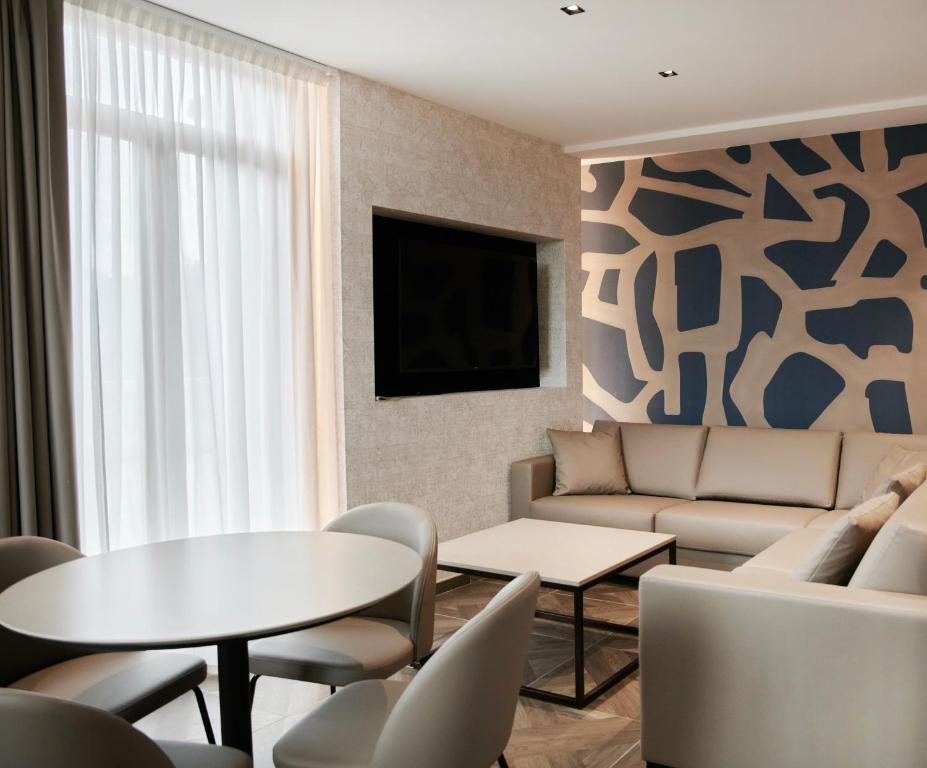 TV a/nebo společenská místnost v ubytování Parc Hotel San Pietro