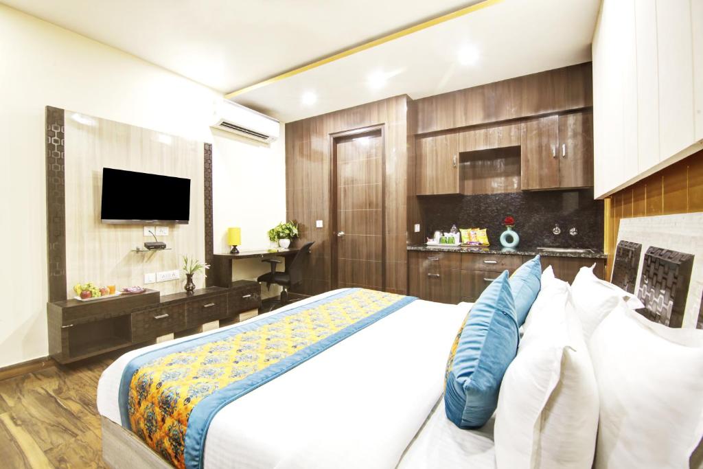 TV a/nebo společenská místnost v ubytování Hotel Grand Manor
