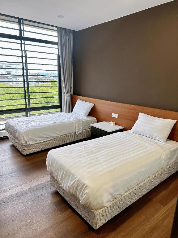 Postel nebo postele na pokoji v ubytování STAR HOTEL