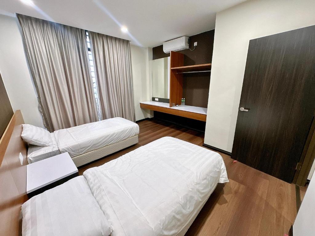 Postel nebo postele na pokoji v ubytování STAR HOTEL