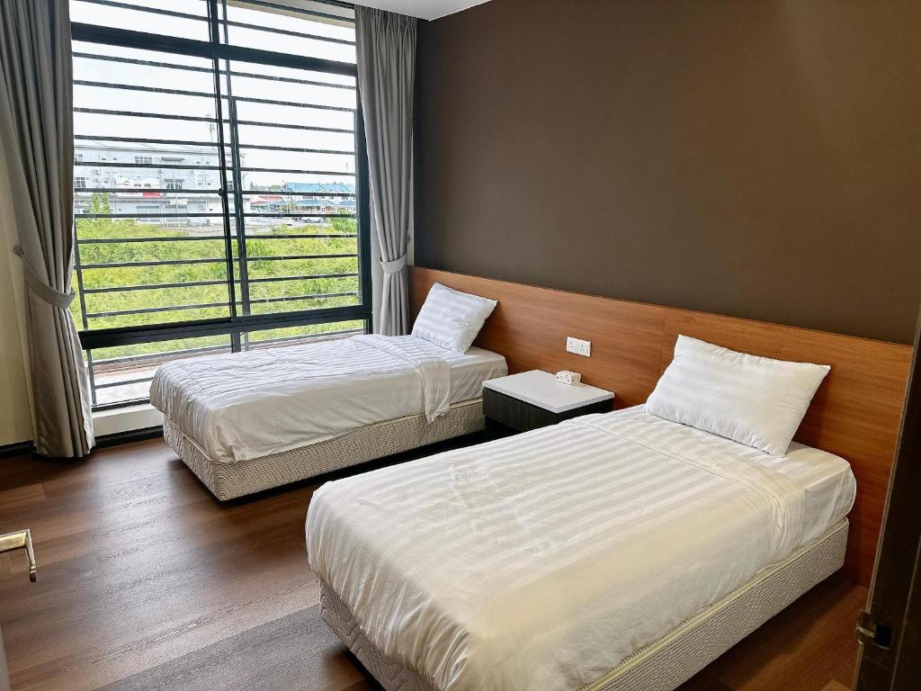 Postel nebo postele na pokoji v ubytování STAR HOTEL