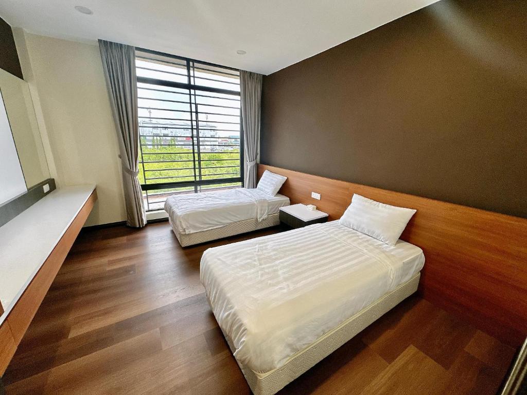 Postel nebo postele na pokoji v ubytování STAR HOTEL