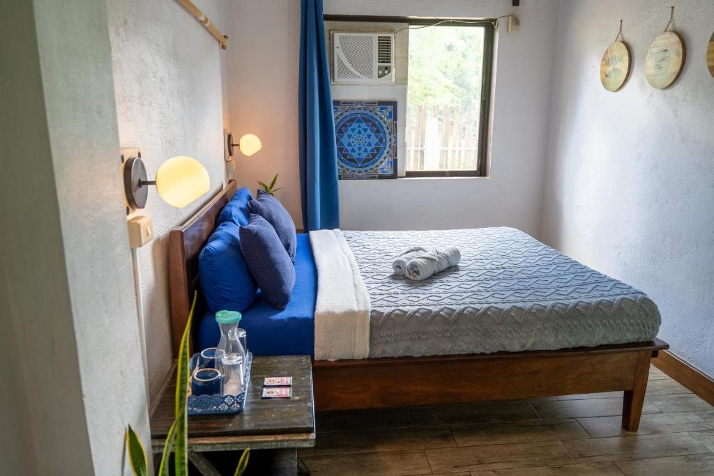 Postel nebo postele na pokoji v ubytování Island Lyfe Adventures