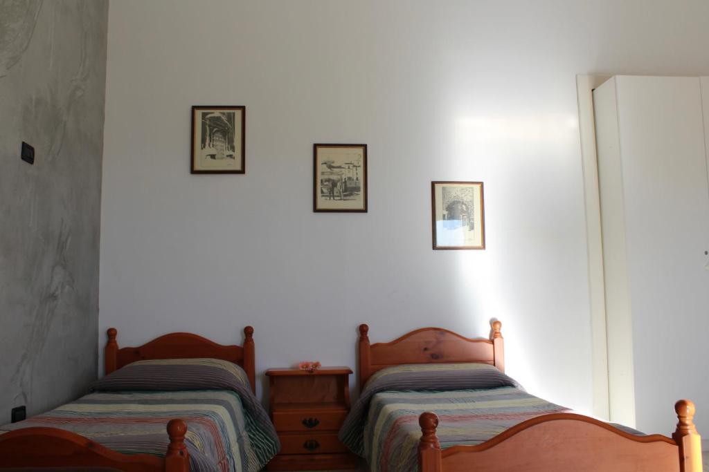 Postel nebo postele na pokoji v ubytování Il Castello di Atessa