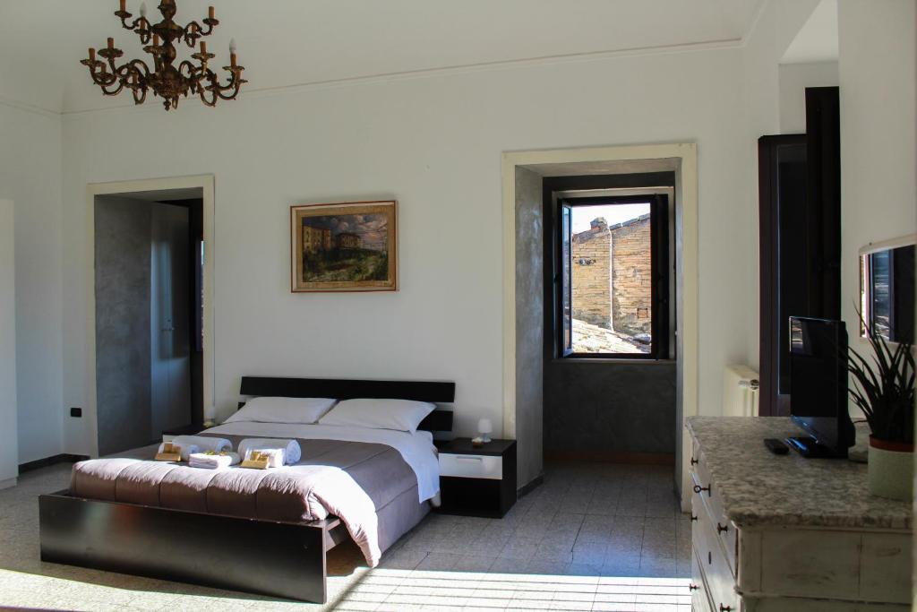 Postel nebo postele na pokoji v ubytování Il Castello di Atessa