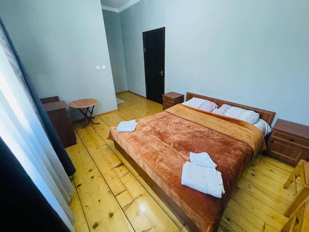 Postel nebo postele na pokoji v ubytování Guesthouse am Museum