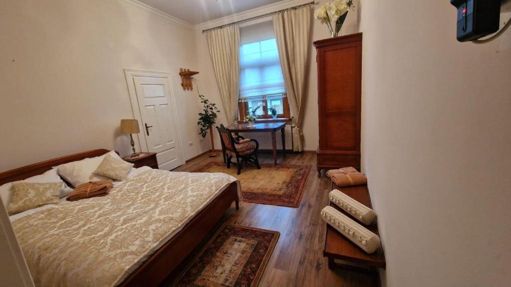 Ένα ή περισσότερα κρεβάτια σε δωμάτιο στο Apartament na Zielonej