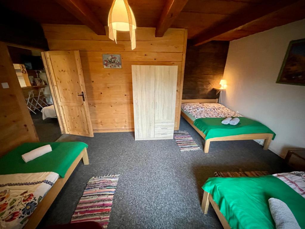Postel nebo postele na pokoji v ubytování u bażanta