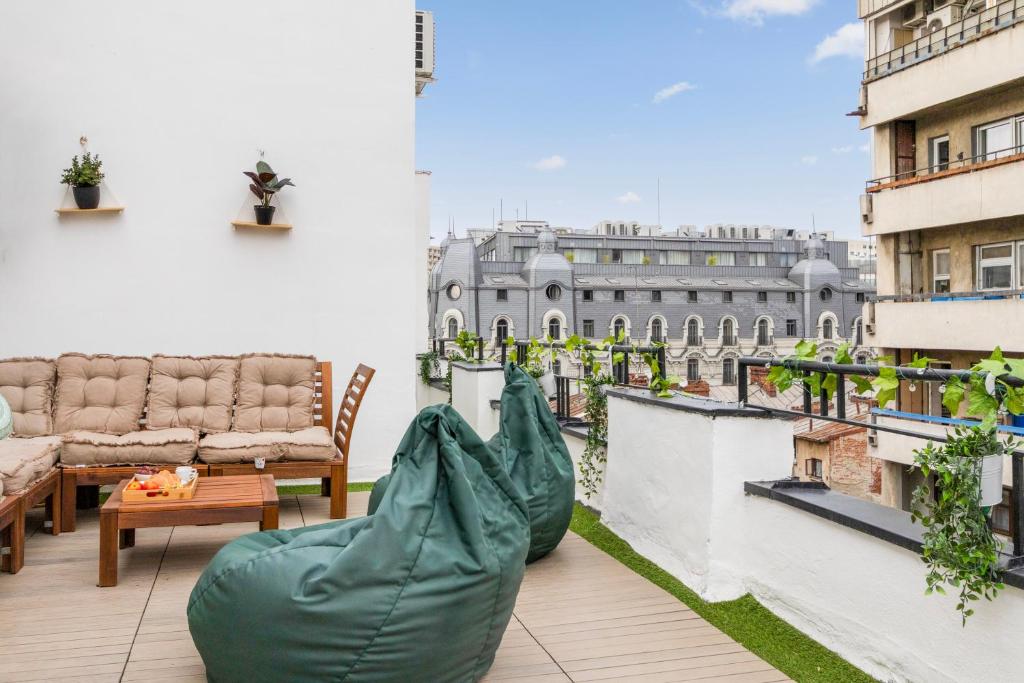 a balcony with a view of a building at SkyCentral Bucharest in Bucharest